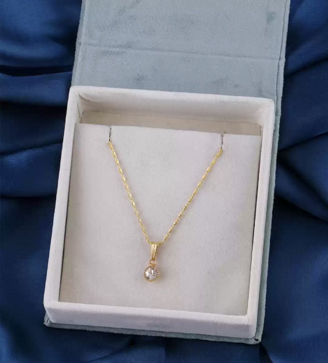 DressBerry Gold-Plated Stone-Studded Pendant with Chain under 99rs